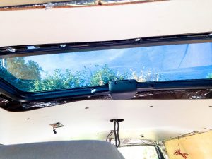 Isolation contre plaqué contour toit ouvrant